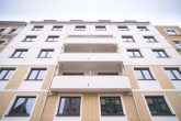 Zentrumsnah wohnen: 3-Zimmer-Wohnung mit Terrasse und EBK in zeitgemäßem Neubau - Hausansicht